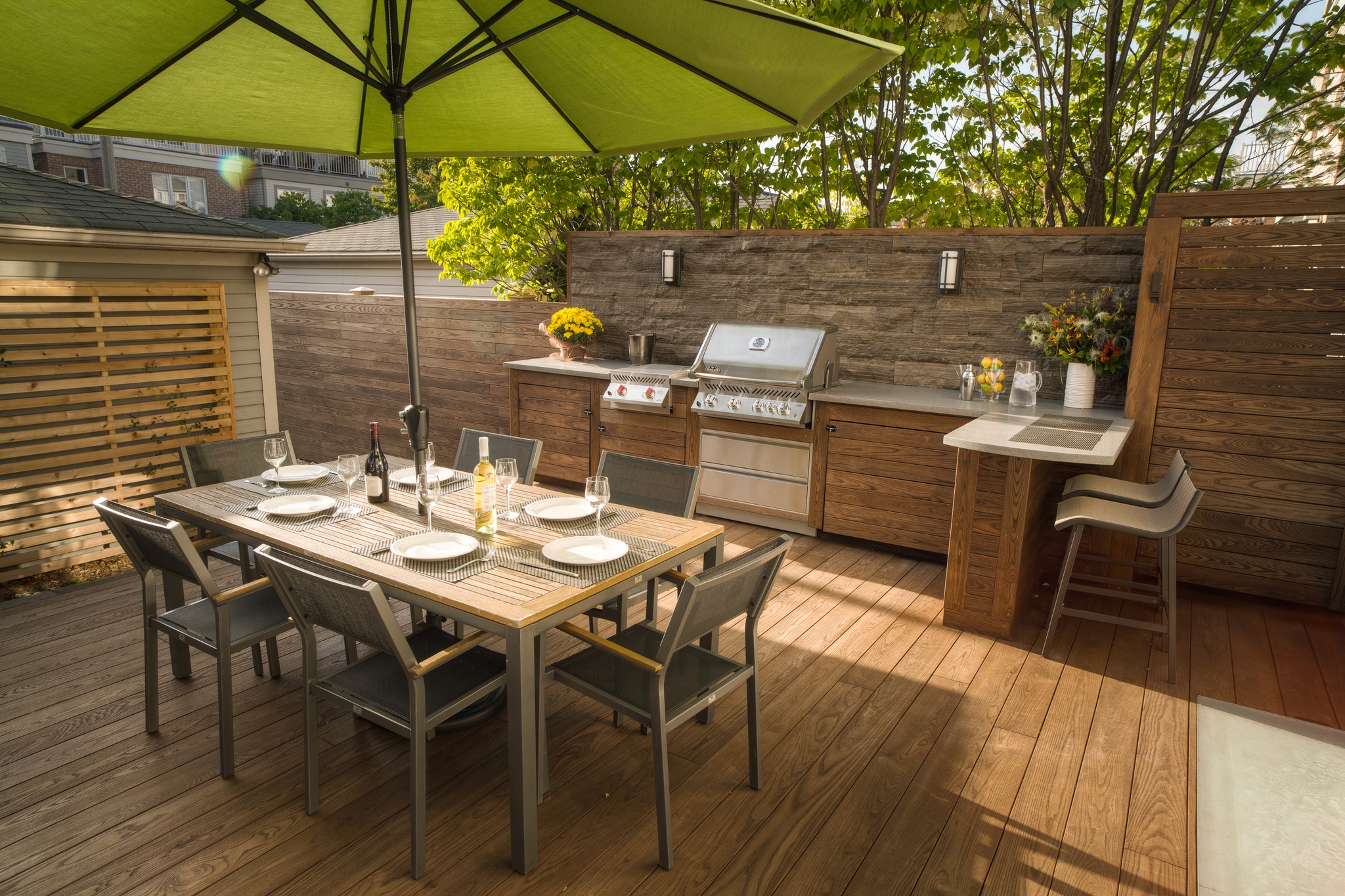 thermory deck with outdoor kitchen