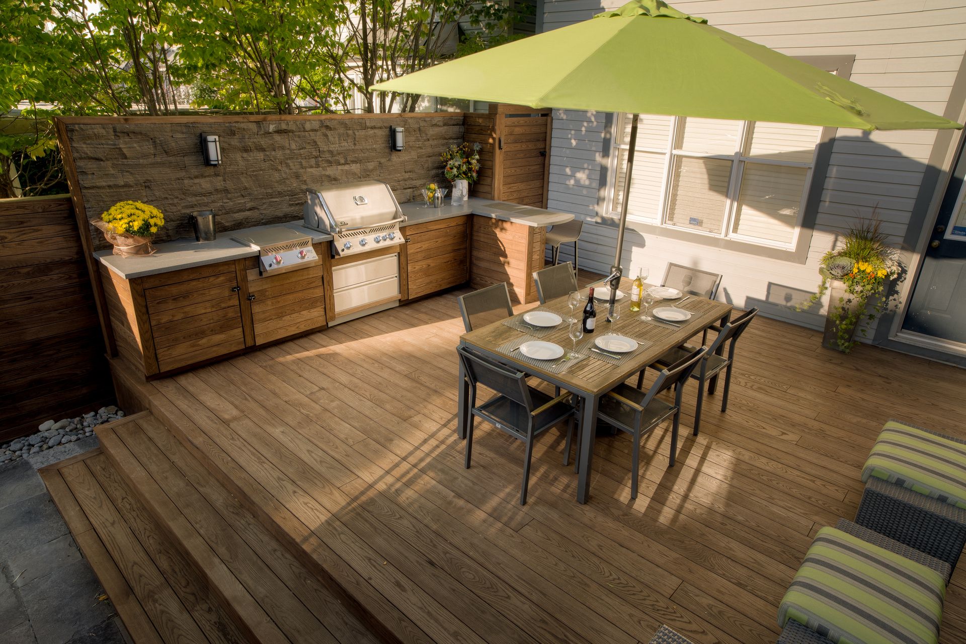 thermory deck with outdoor kitchen